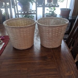 Two wicker planter baskets